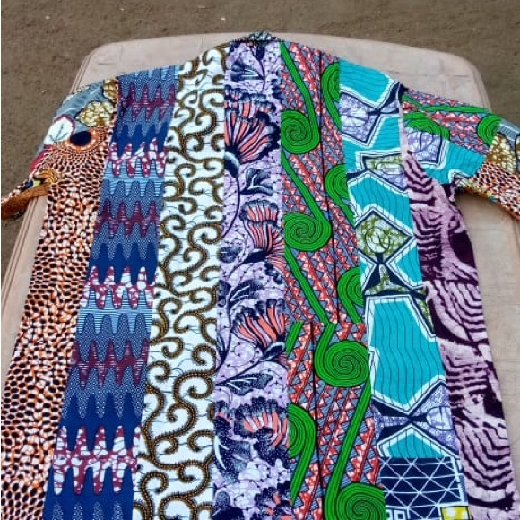 These shirts are made by Didier Adjewodo of Togo, West Africa. - Picture 3 of 6